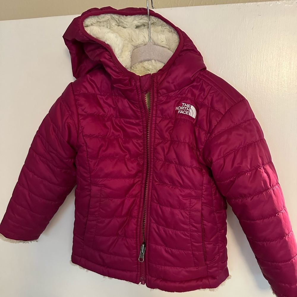 Kid’s reversible North Face full-zip hooded coat